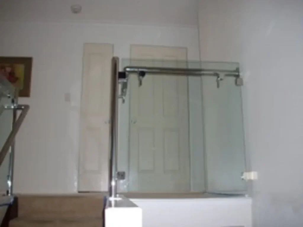 Single glass balustrade installed by Frog Glass in a residential setting in Brisbane