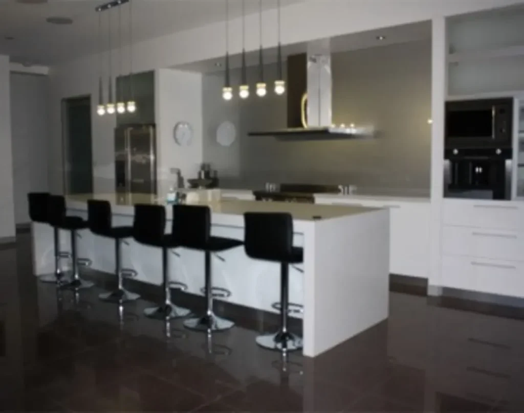 Glass splashback in a kitchen cooking area installed in Brisbane
